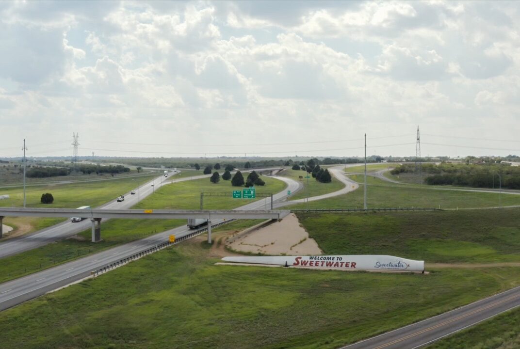 Drone photograph of the Sweetwater sign on windmill blade off I-20 by the video production company, Cre8ive